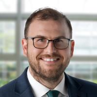 Headshot of Nathan J. Andrew.